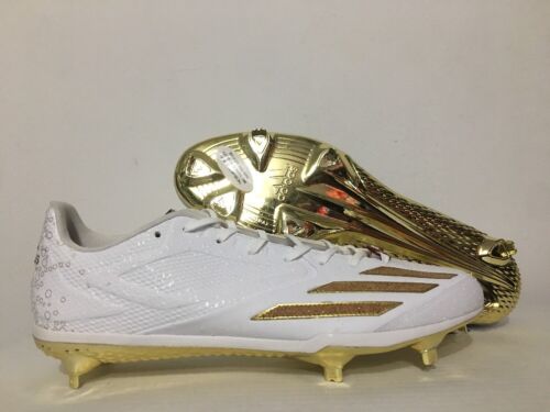 white and gold baseball cleats